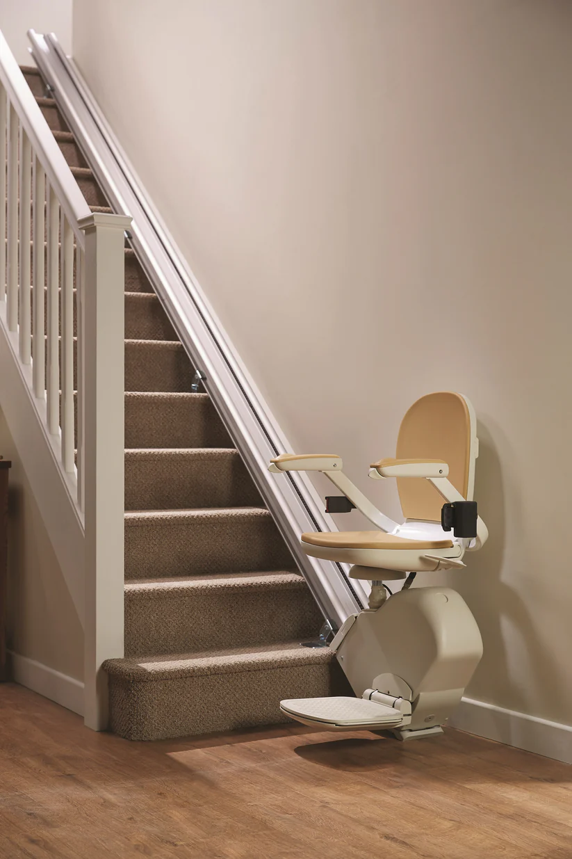 Straight stairlift installed on a staircase in a UK home